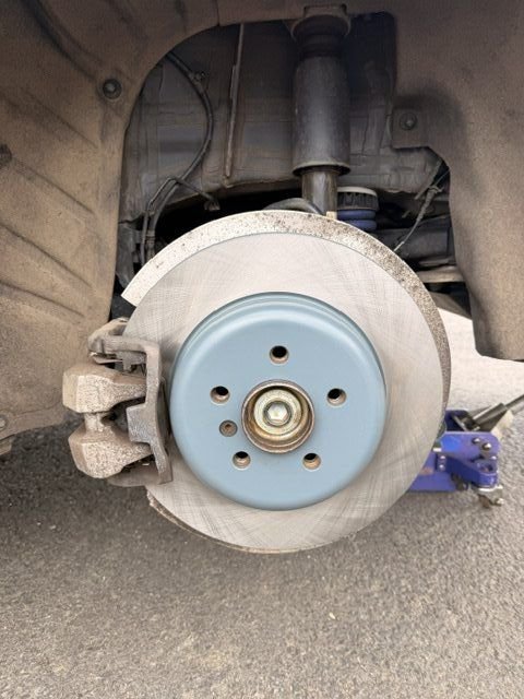 Fresh brake rotor installed on vehicle