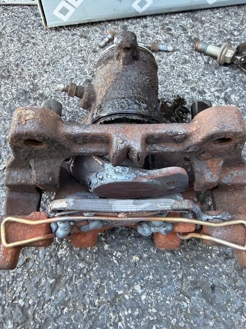 Badly seized caliper removed from vehicle